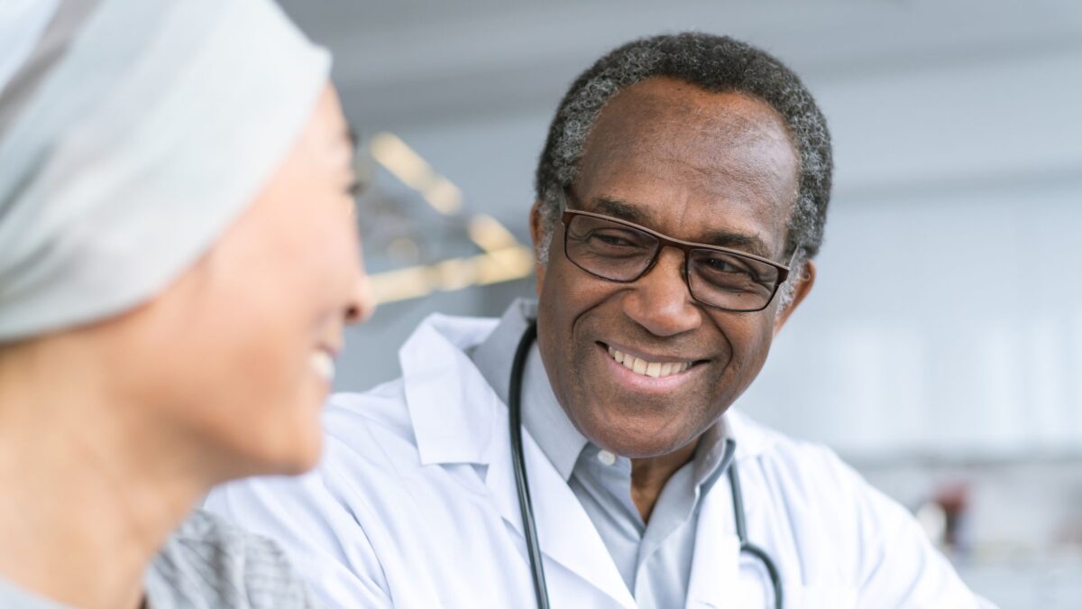 Oncologist speaking to a skull base tumour patient